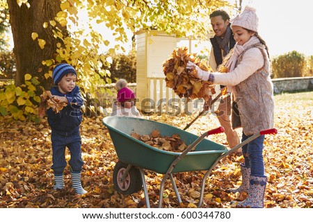 Similar – Image, Stock Photo three wheelbarrows, a rake, a chopper and 2 watering cans are off duty