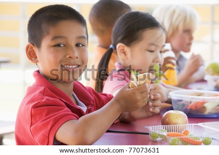 Similar – Image, Stock Photo Child eats sandwich outdoor