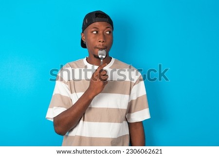 Similar – Image, Stock Photo Black man in trendy outfit near bicycle in city