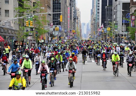 New York City, USA, - May. 4. 2014: people riding the bike along 6th Avenue at Five Boro Bike Tour, New York, USA