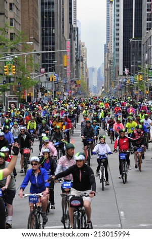 New York City, USA, - May. 4. 2014: people riding the bike along 6th Avenue at Five Boro Bike Tour, New York, USA
