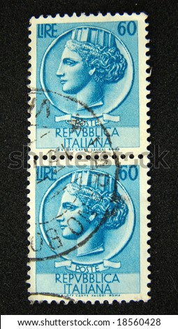 Italy postage stamps on black background