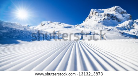 Similar – Image, Stock Photo Groomed ski trails for cross-country skiing in winter landscape in valley Studen, Switzerland famous for winter sport. Flat landscape is surrounded by mountains and illuminated by midday sun.