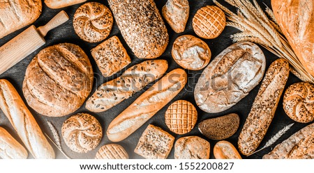 Similar – Image, Stock Photo Fresh bread on table in kitchen