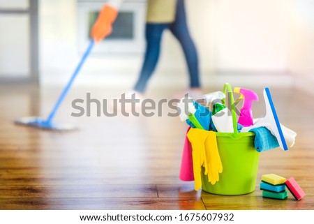 Bucket or basket with cleaning items for wash or house cleaning. 