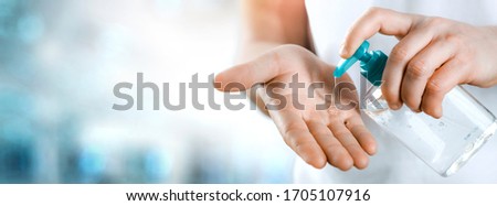 Similar – Image, Stock Photo doctor man using alcohol disinfectant gel. using protective mask and gloves during corona virus covid 2019 pandemic. Health care and medical concept