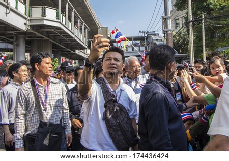 Bangkok, Thailand - Jan19, 2014: Anti-government supporters take a photo to himself and Suthep Thaugsuban, the PDRCs Secretary-General during the march under the campaign for reform before election.