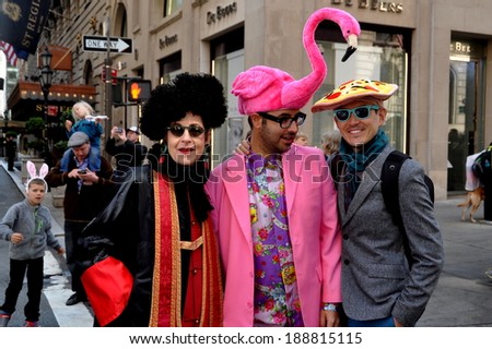 NYC - April 20, 2014:  A trio of elegant people sporting their Easter finery at the 2014 Easter Parade on Fifth Avenue