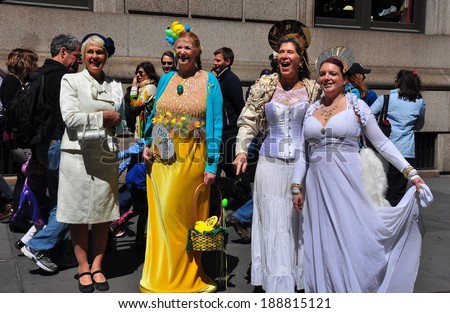 NYC - April 20, 2014:  A group of women sporting beautiful gowns at the April 20, 2014 Easter Parade on Fifth Avenue