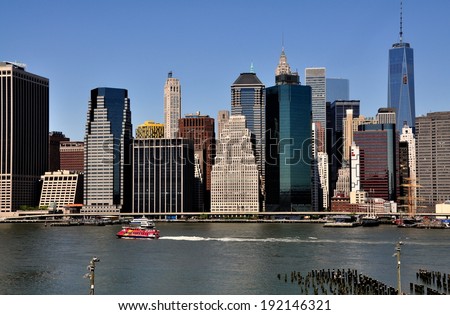 NYC - May 11, 2014:  View of lower Manhattan skyscrapers in the Wall Street area seen from the Promenade in Brooklyn Heights