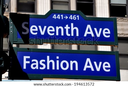 NYC - March 27. 2014 :  Street signs at the corner of Seventh Avenue and West 34th Street in the stretch known as Fashion Avenue