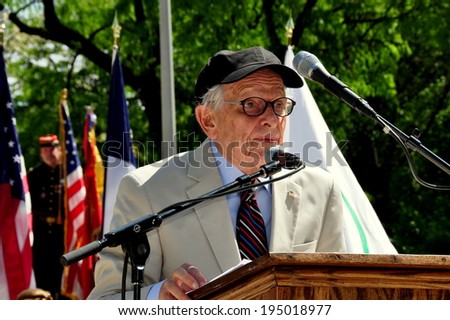 NYC - May 26, 2014:  Memorial Day holiday event organiser emeritus Dr. George Chall addresses the audience during ceremonies in Riverside Park