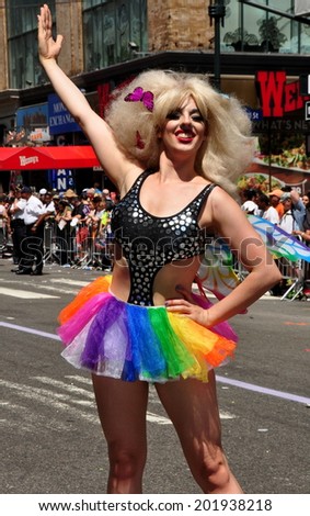 NYC - June 29, 2014: Man in drag sporting a rainbow tutu at the 2014 Gay Pride Parade on Fifth Avenue