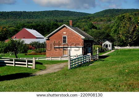 Hancock, Massachusetts - September 7, 2014 :  View to the Poultry House (center), Garden Tool Shed (right), and the Berkshire Hills at the Hancock Shaker Village