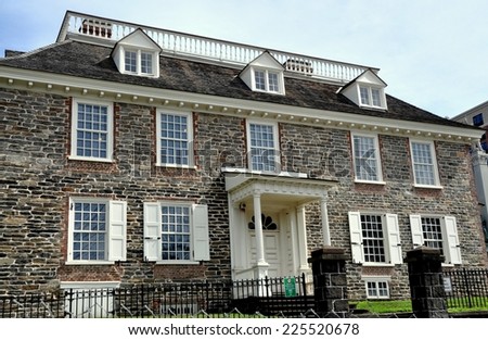 Yonkers, NY - August 6, 2012:  The fieldstone south front and portico doorway with fan window at the Georgian Philipse Manor Hall built in 1693