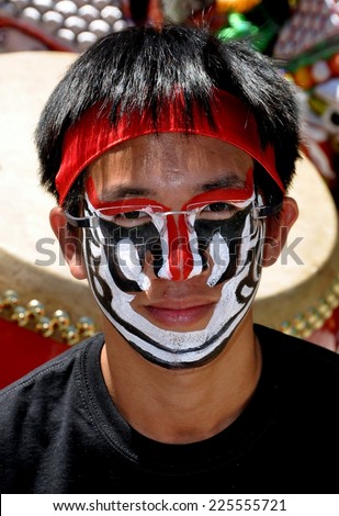 NYC - May 28, 2010: Young Flower Drum musician with traditional painted face at the Passport to Taiwan Festival in Union Square