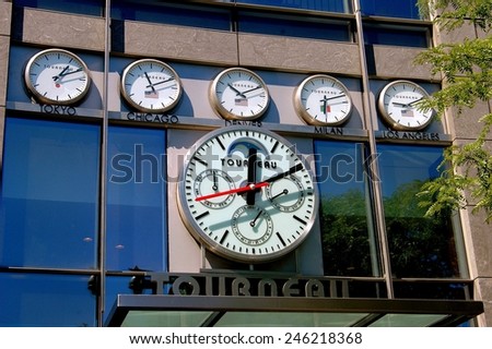 New York City - September 3, 2004:  Tourneau clocks give the time in various world cities on the exterior of their shop at the exclusive Time Warner Center at 10 Columbus Circle