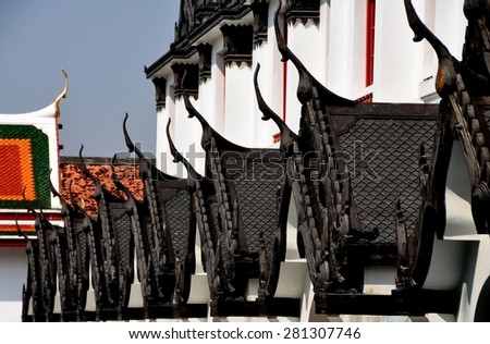 Bangkok, Thailand - December 17, 2012:  Iron roof dormers over side chapels at the Loha Prasat, Iron Castle, at Wat Ratchanadda