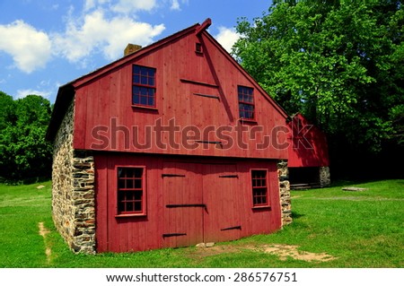 Chadds Ford, Pennsylvania - June 8, 2015:  Fieldstone and wooden barns at the Gideon Gilpin House in Brandywine Battlefield National Historic Park