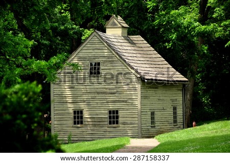 Ephrata, Pennsylvania - June 6, 2015:  :  The wooden Carpenter's House at the historic 18th century Ephrata Cloister Germanic religious settlement