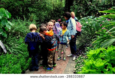 Kennett Square, Pennsylvania - June 3, 2015:  A group of school children with their teachers on a visit to the Conservatory at Longwood Gardens