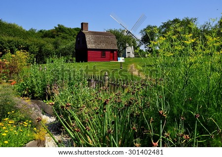 Middletown, Rhode Island - July 16, 2015:  C. 1700 Guard House with medicinal and herb garden at Prescott Farm Historic Site
