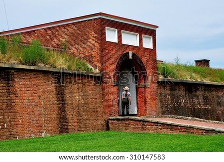 Baltimore, Maryland - July 24, 2013:  U. S. Park Ranger stands at the sally port entrance to historic Fort McHenry