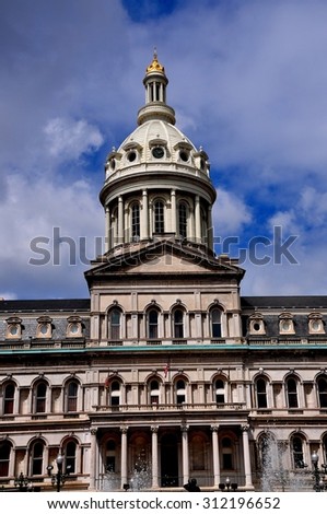 Baltimore, Maryland - July 23, 2013:  City Hall, begun in 1867, built in Second Empire style with distinguished Mansard roofs topped by a dome with gilded cupola