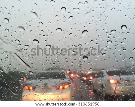 Outside the car in the rain day
