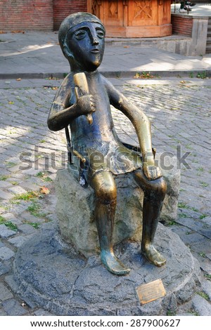 GEORGIA, TBILISI - August 5, 2013: Tamada - Bronze copy of sculpture toastmaster in the old center of Tbilisi