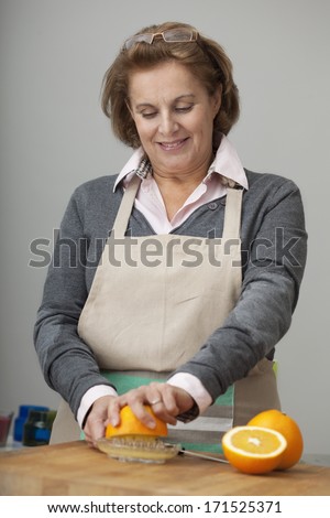 Elderly Person Eating Fruit