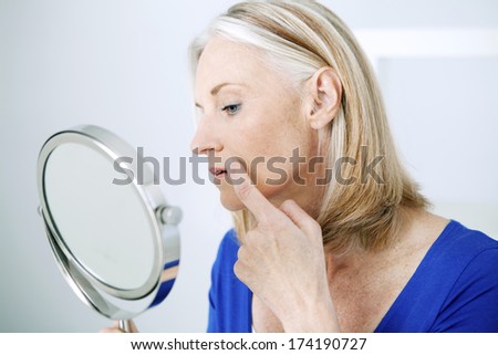 Elderly Person With Mirror