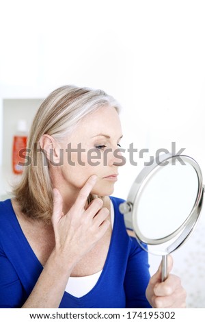 Elderly Person With Mirror