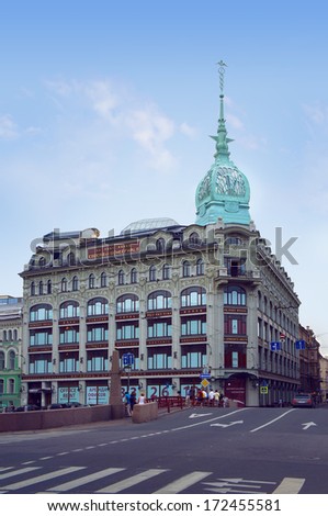 The Trade House of Esders and Scheefhals/SAINT PETERSBURG, RUSSIA - JULY 5: Tourists walk alongside Gorokhovaya street near Trade House of Esders and Scheefhals on July 5, 2013 in Saint Petersburg.