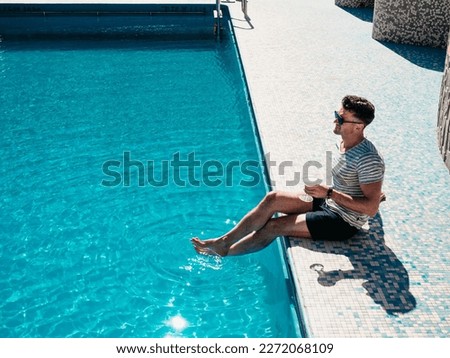 Similar – Image, Stock Photo Man swimming in clear water in sunlight