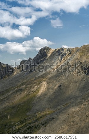 Similar – Image, Stock Photo Mountain ridge under blue cloudy sky