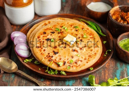 Similar – Image, Stock Photo Indian flatbreads on a blue background, above view. Homemade naan bread