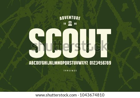 Original sans serif font. Bold face. Letters and numbers for logo and emblem design. White print on green texture background