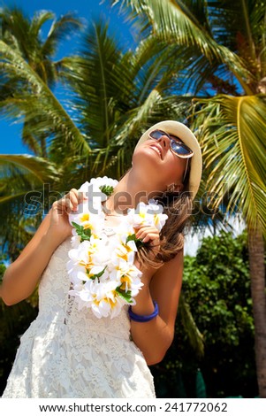 Happy people. Woman with welcoming Lei cheerful, happiness during summer vacation holidays on Hawaii.