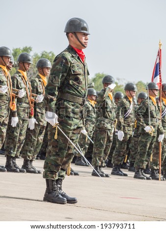 CHONBURI, THAILAND - JAN 18, 2014 : Unidentified marine with naval sword performing Military Parade of Royal Thai Navy on January 18, 2014 at Sattahip Naval Base, Chonburi, Thailand