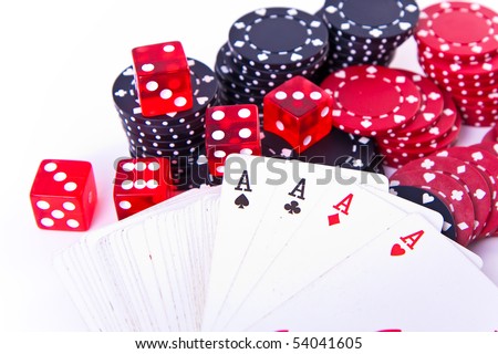 four aces with poker chips and two dice on white background