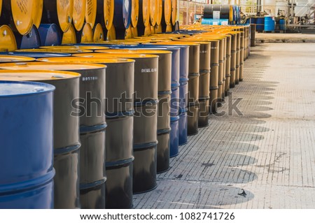 Image, Stock Photo Stacked up, rusty metal barrels are reflected in puddle