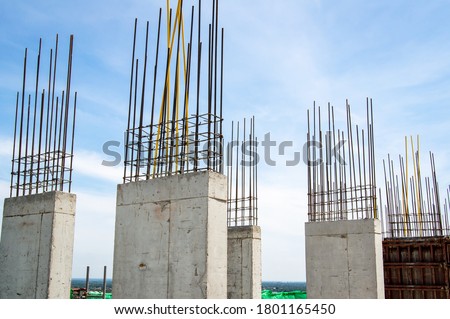 Steel reinforce in concrete column.Steel grid on the construction site.Reinforcement of concrete work. Using steel wire for securing steel bars with wire rod for reinforcement of concrete 