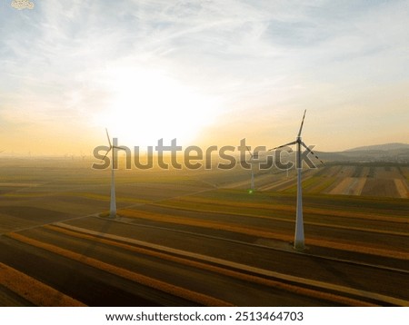 Similar – Image, Stock Photo Wind turbine in the field, toned photo. Wind power energy concept