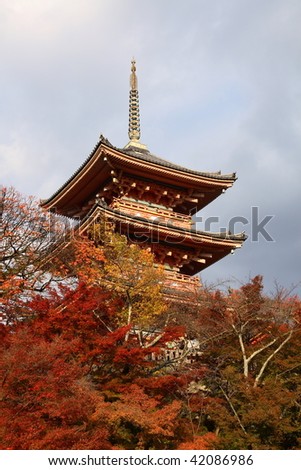 Famous pagoda of Kiyumizu Dera temple in autumn with a grey sky(Kyoto, Japan)