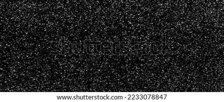 Snow, stars, fairy twinkling lights, rain drops on black background. Abstract vector noise. Small particles of debris and dust. Distressed uneven grunge texture overlay.
