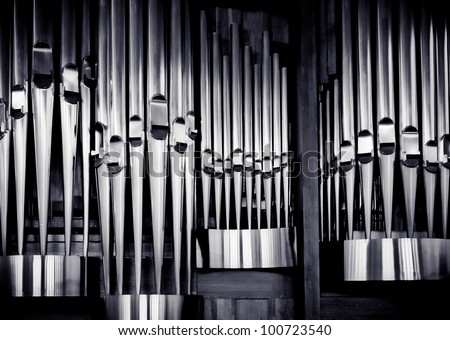 Church organ pipes. The shining of music.