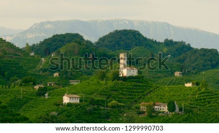 View of the green Prosecco wine hill - Saint Lorenz Church, Chiesetta di San Lorenzo, Farra di Soligo, Conegliano Valdobbiadene, Strada del Prosecco, Prosecco road Zdjęcia stock © 