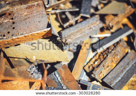Closeup pile of scrap metal junk garbage. texture background