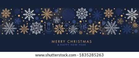 Merry Christmas and Happy New Year festive design with border made of beautiful snoflakes in modern line art style. Winter dark blue background with falling snow. Xmas decoration. Vector illustration. Stock foto © 